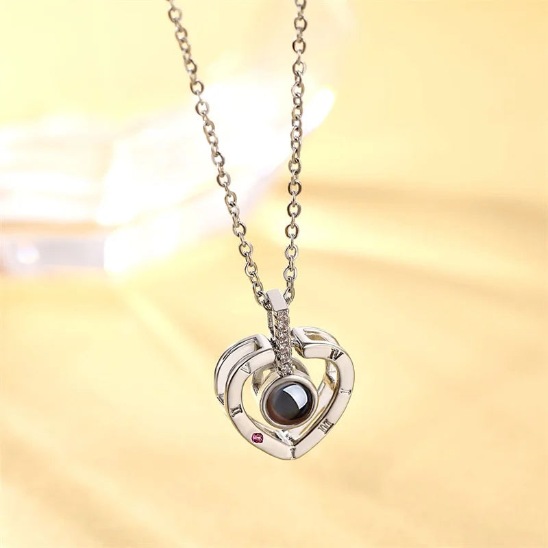 Collar Te amo en 100 idiomas de Plata en caja de rosa ascendente